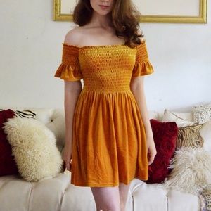 Gold off the shoulder dress from Urban Outfitters